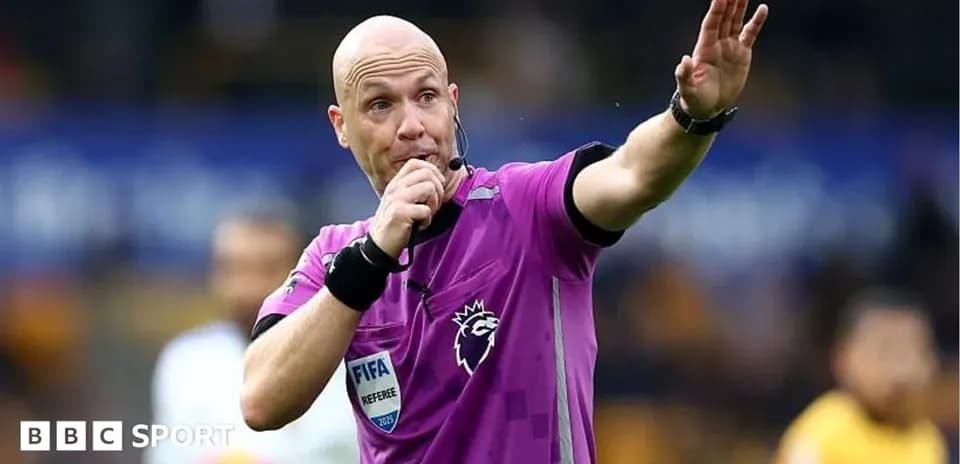 Referee signaling during a football match