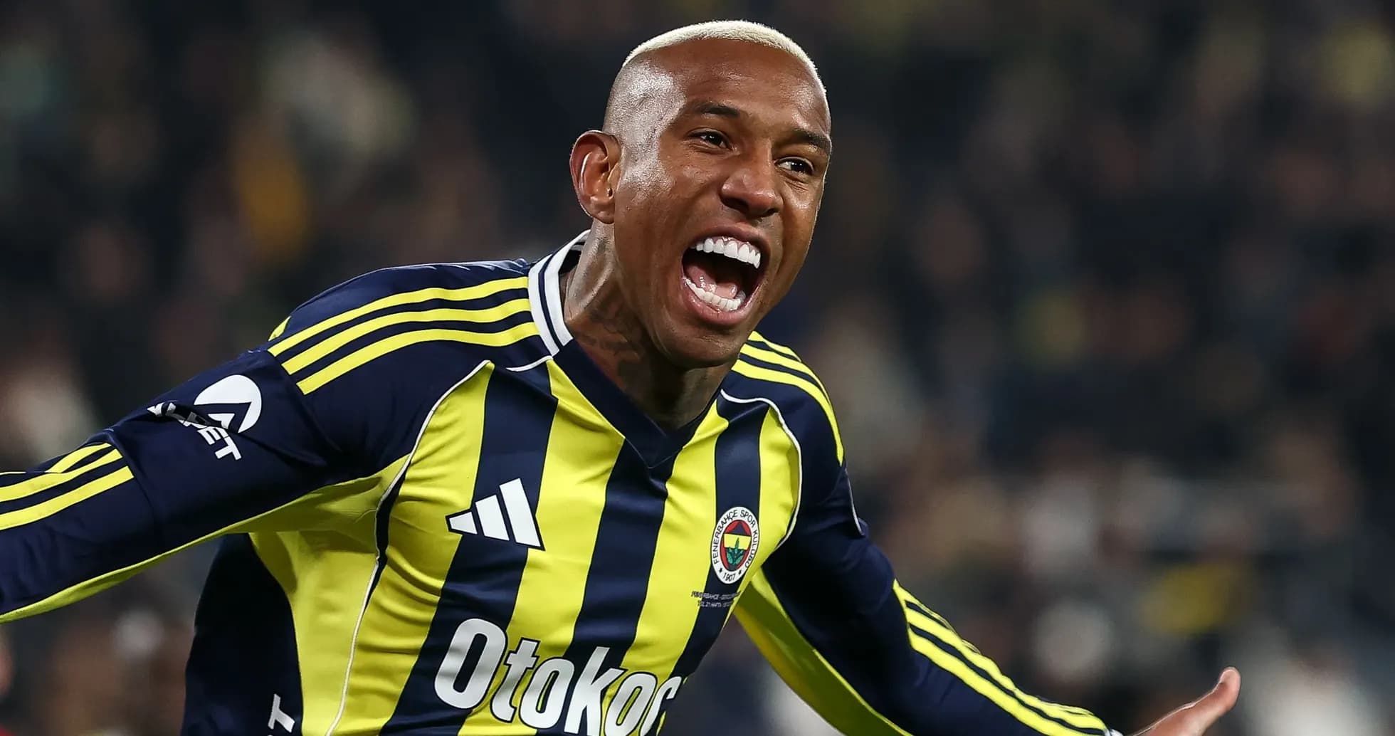 Fenerbahçe player celebrating a goal on the field