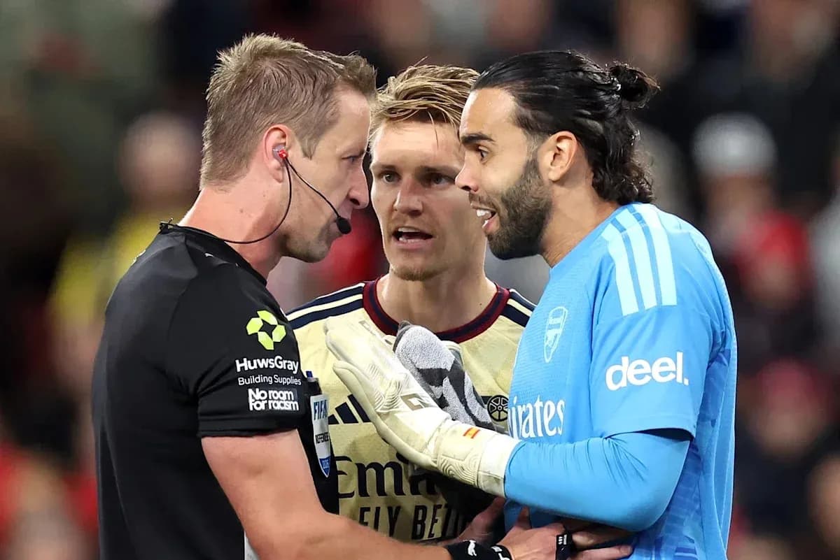 Referee discussing with players during match situation
