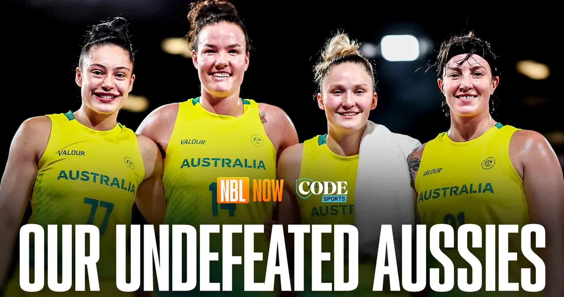 Four Australian basketball players celebrating together
