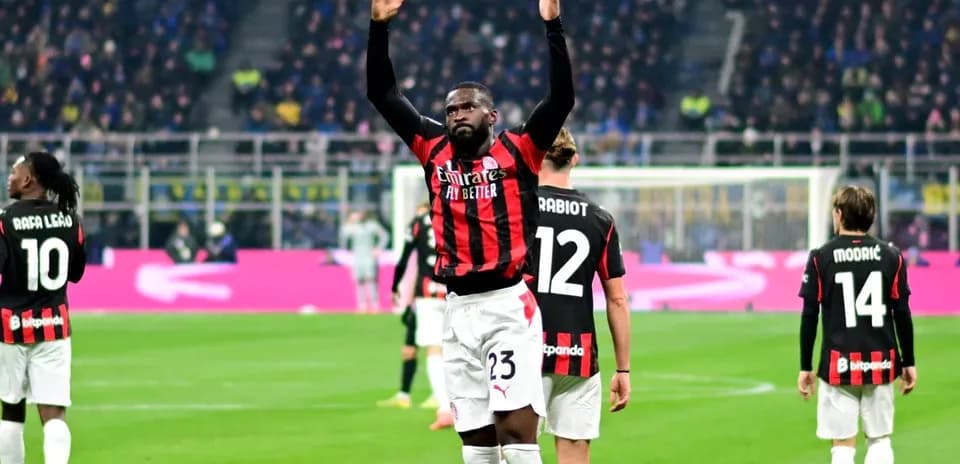 AC Milan players celebrating after a goal