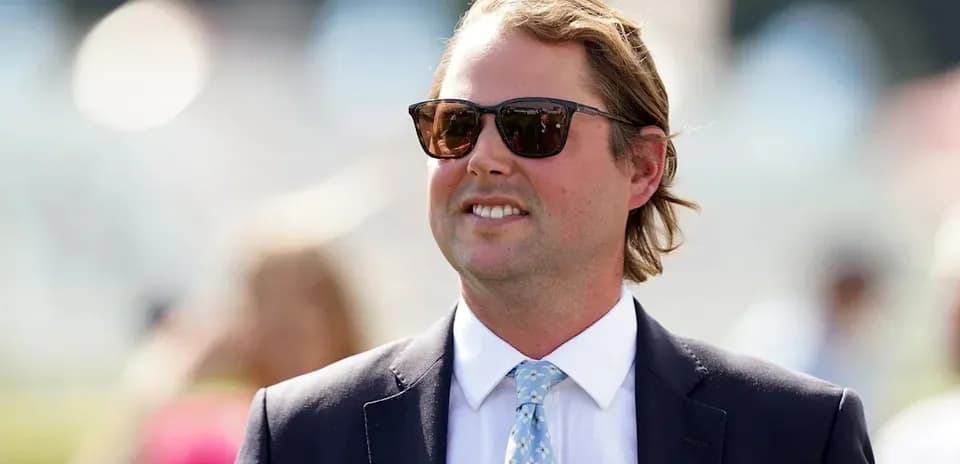 Man wearing sunglasses at outdoor event