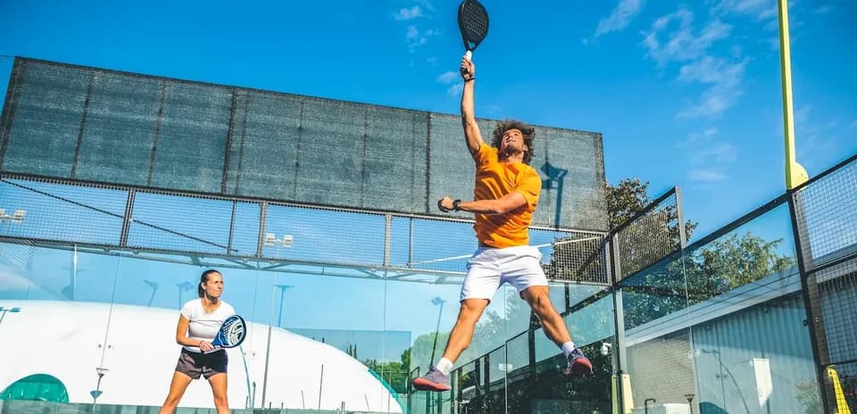 Tennis players competing on outdoor court
