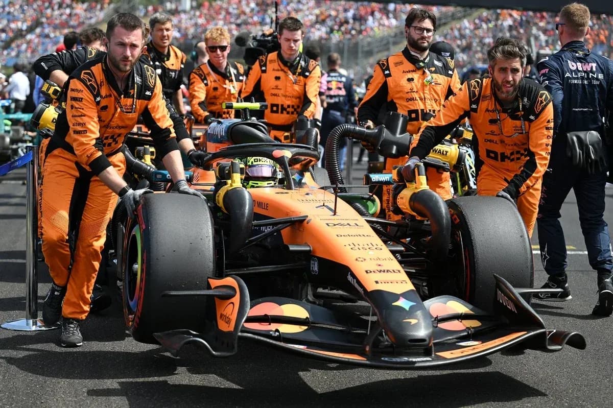 McLaren team preparing car on the grid