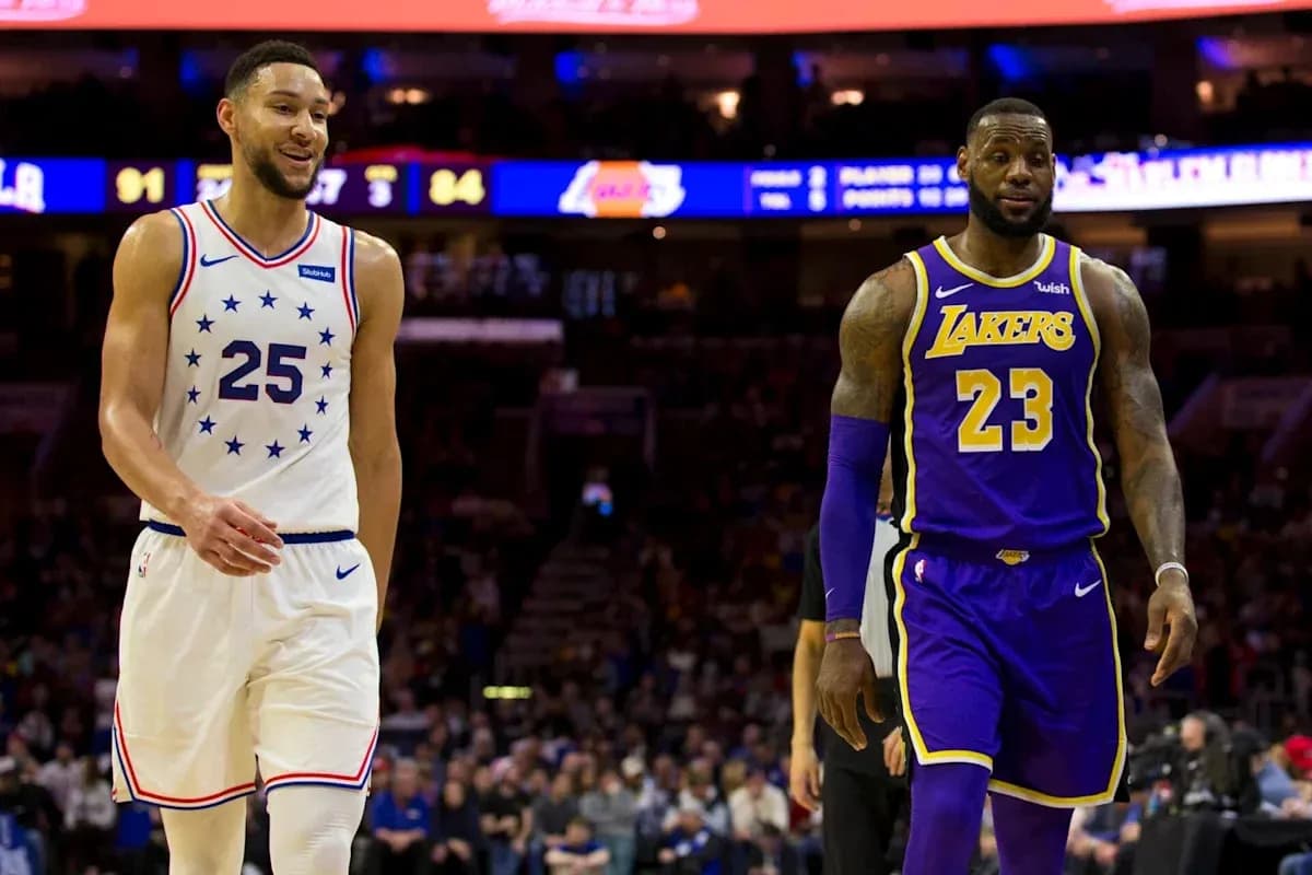 Ben Simmons and LeBron James walking on court