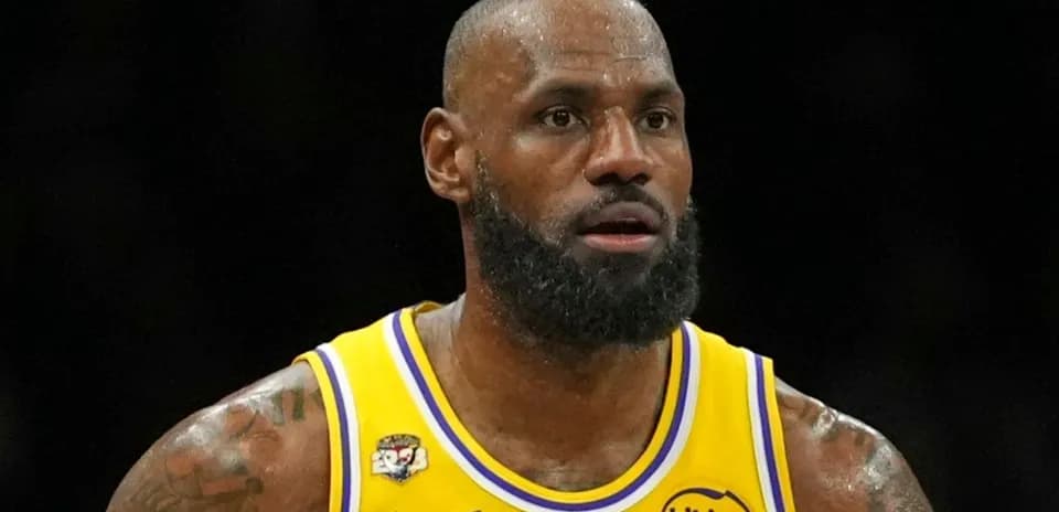 LeBron James in yellow Lakers jersey during game