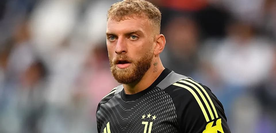 Goalkeeper wearing Juventus kit on the field