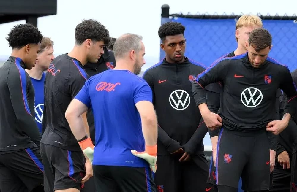 USA soccer team in training session discussing strategy
