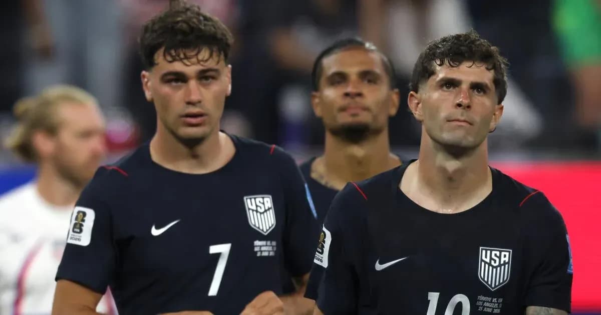 US players walking off the pitch after match