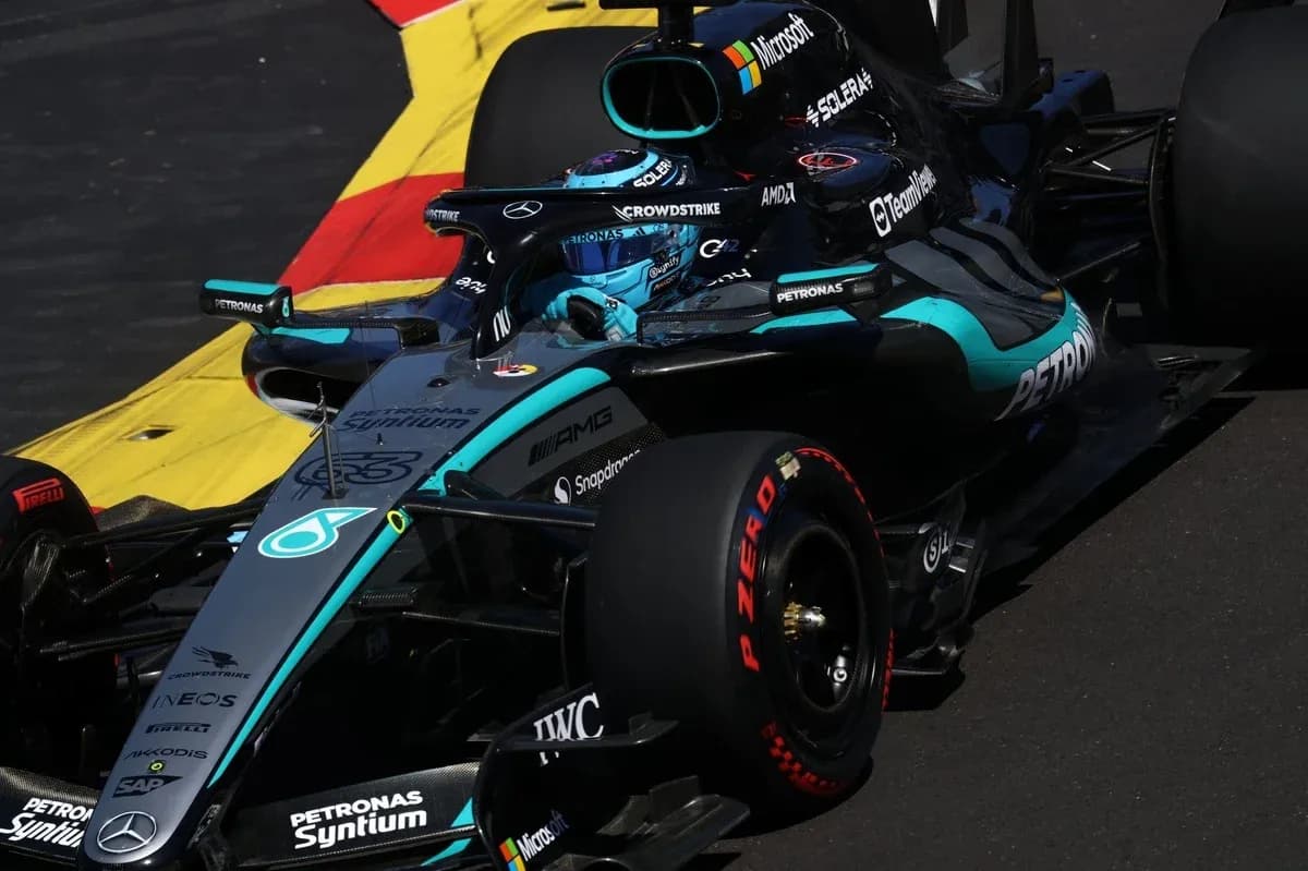 Mercedes Formula 1 car navigating a corner on track