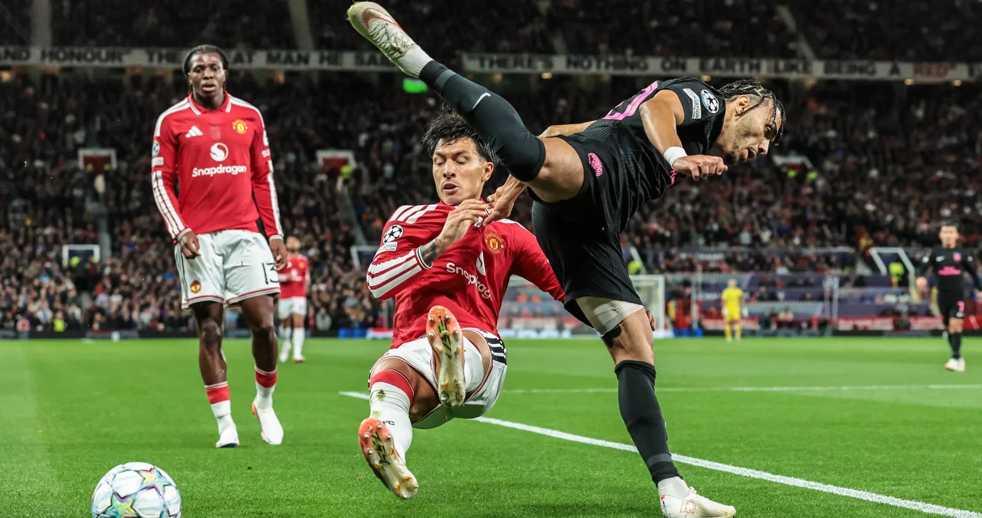 Player tackling opponent near sideline during match