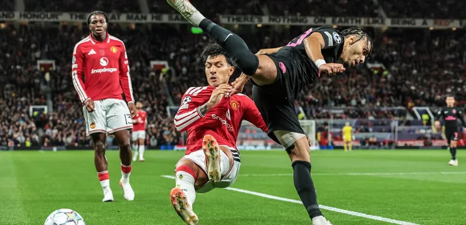 Player tackling opponent near sideline during match