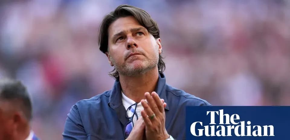 Coach looking up and clasping hands together