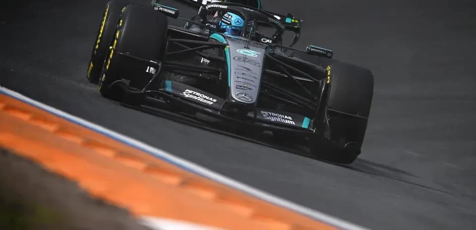 Mercedes F1 car racing on track during event