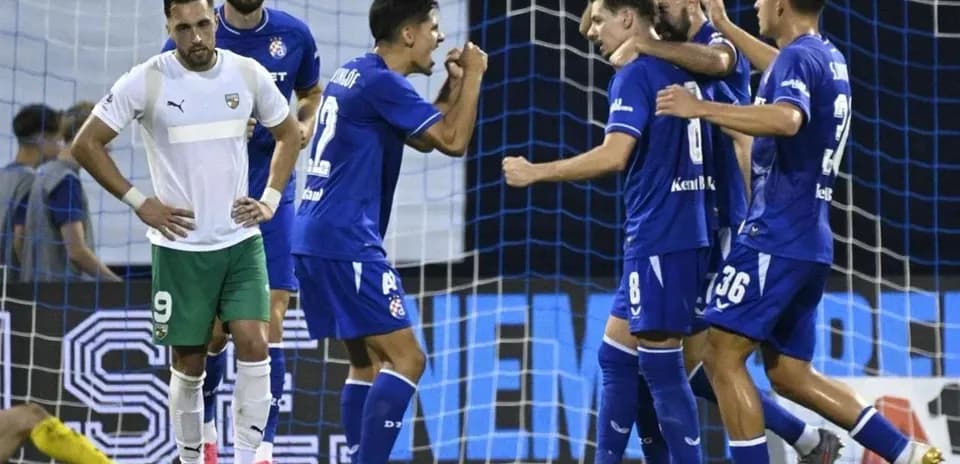 Players celebrating a goal during football match