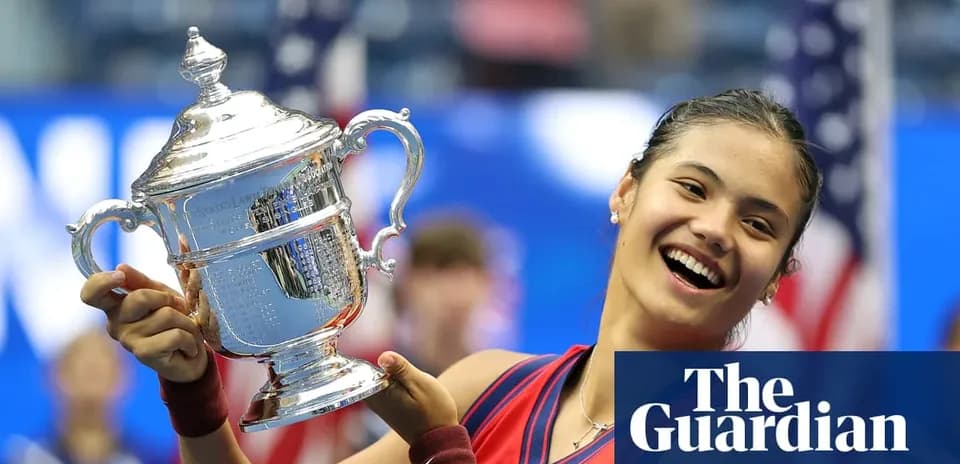 Tennis player holding trophy at US Open victory