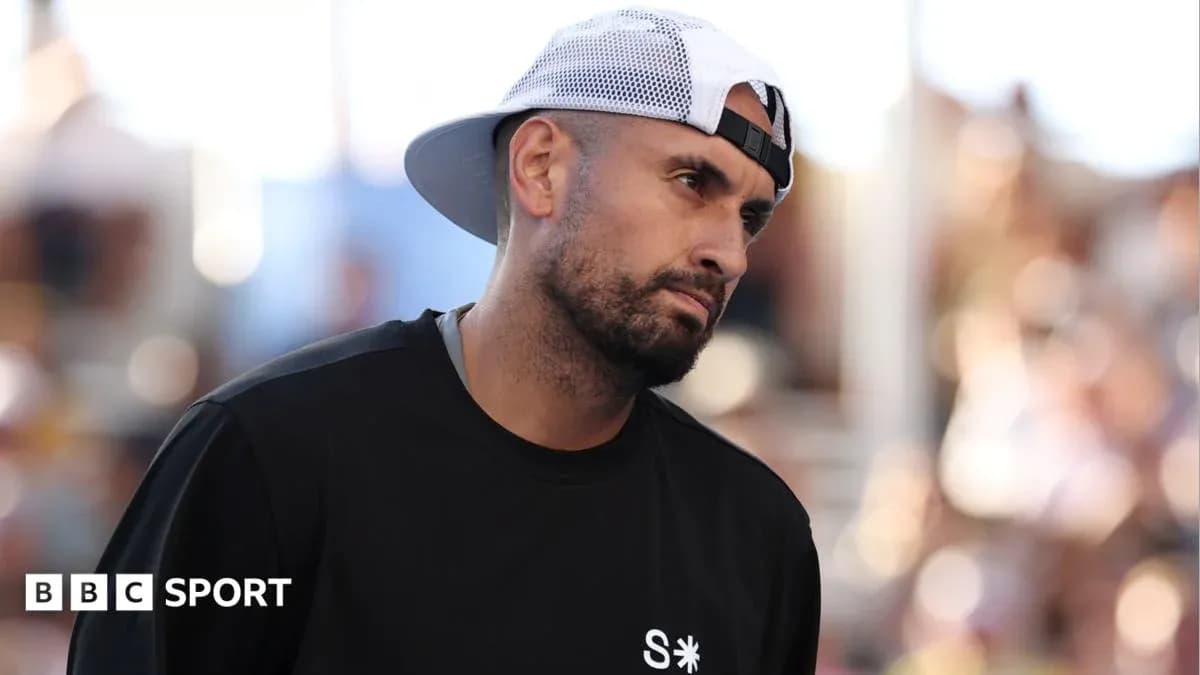 Tennis player walking off court during match
