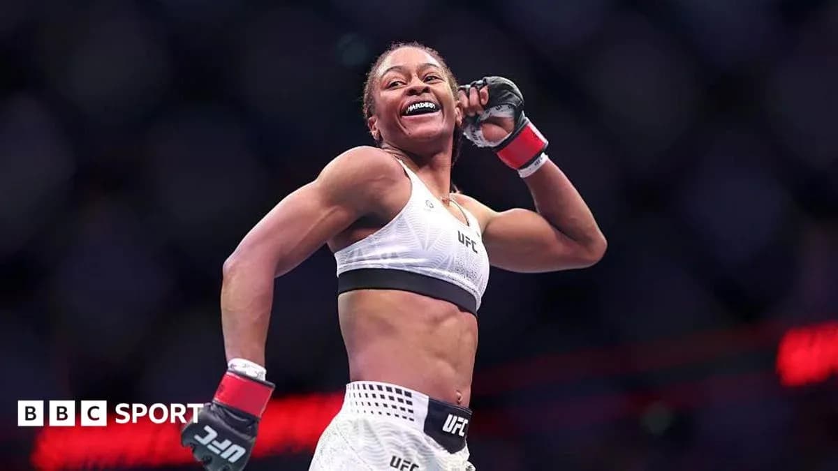 UFC fighter celebrating in the octagon after match
