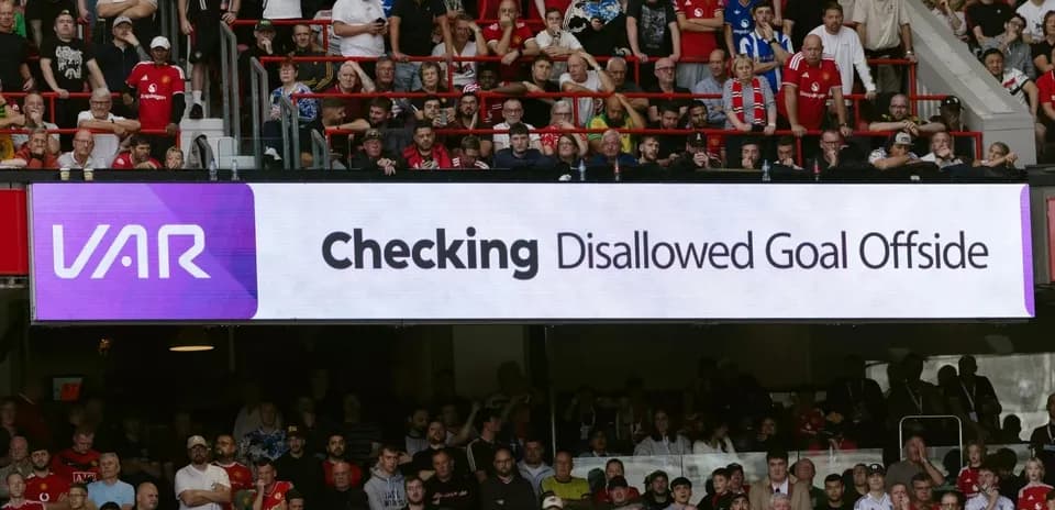 VAR display showing disallowed goal message in stadium