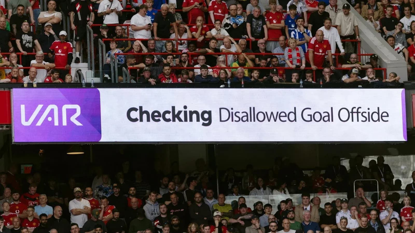 VAR display showing disallowed goal message in stadium