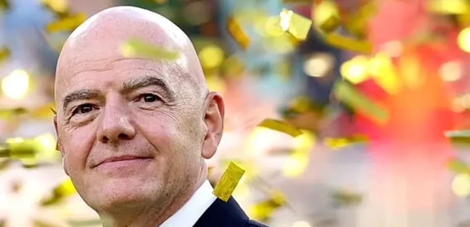 FIFA president surrounded by confetti at event