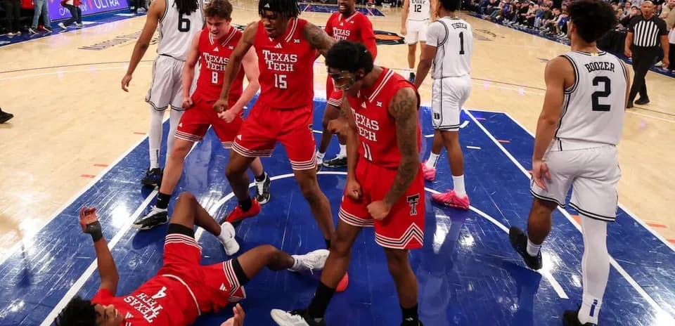 Texas Tech players celebrating after a play during game