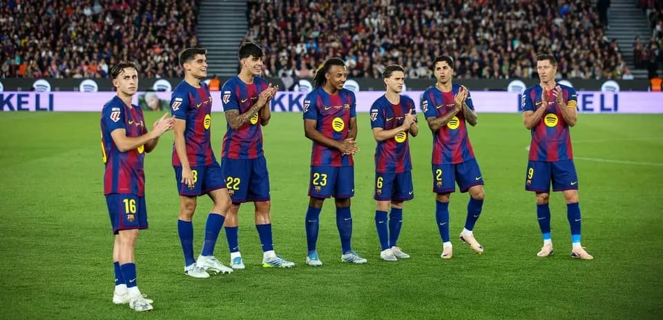 Barcelona players applauding during a match event