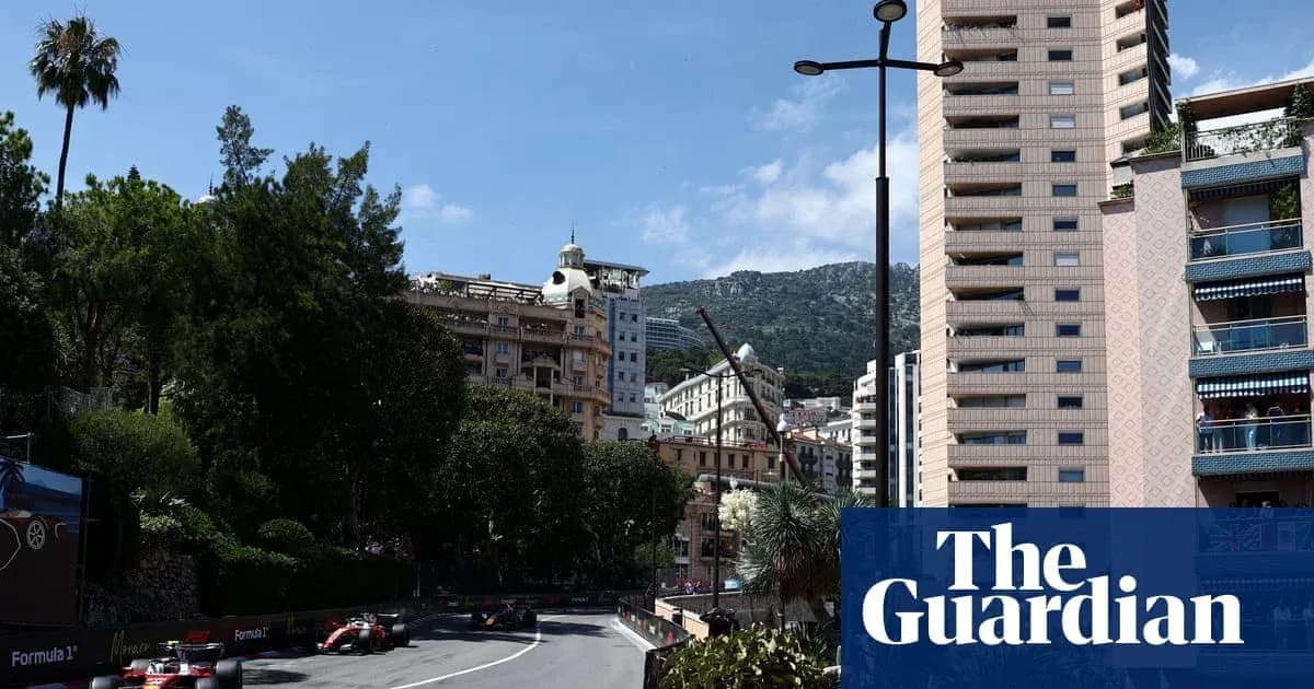 Formula 1 cars racing on Monaco street circuit