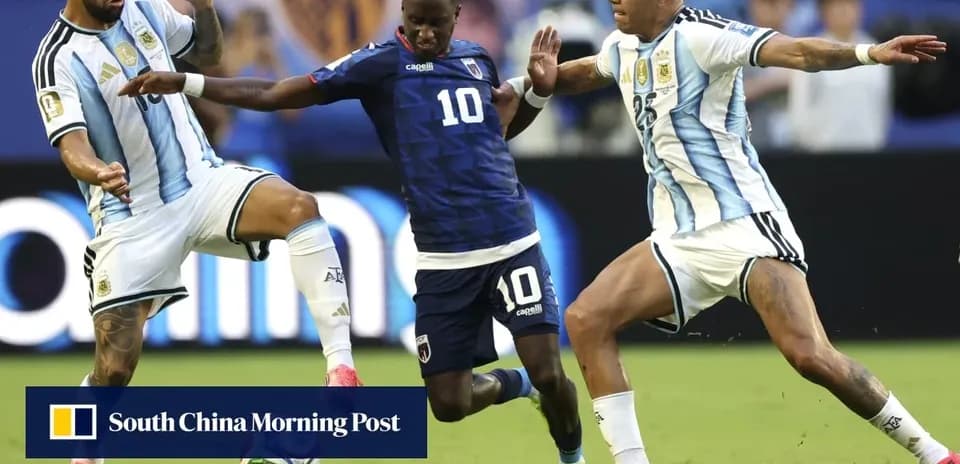 Three players contesting for the ball during match