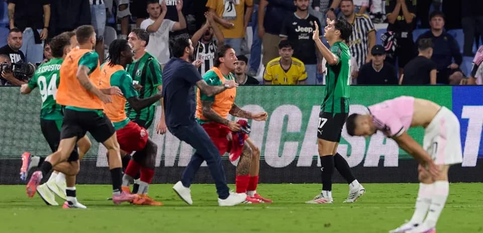 Sassuolo players celebrating a goal on the pitch