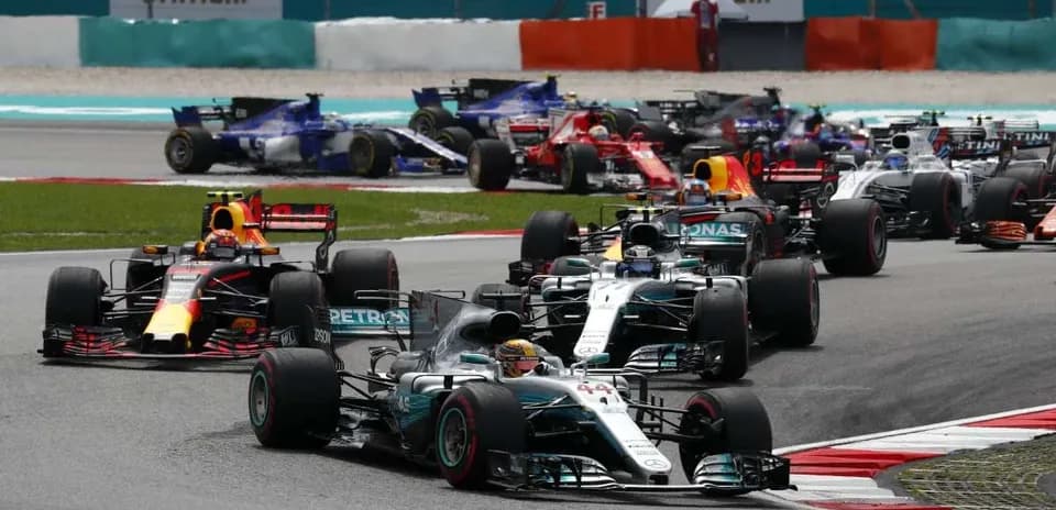 Formula 1 cars racing at the track