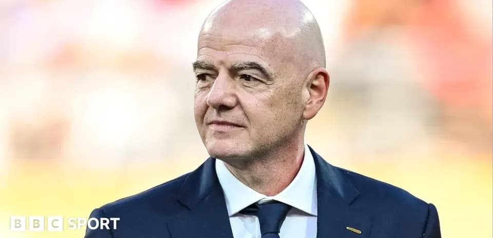 FIFA president walking at sports event venue