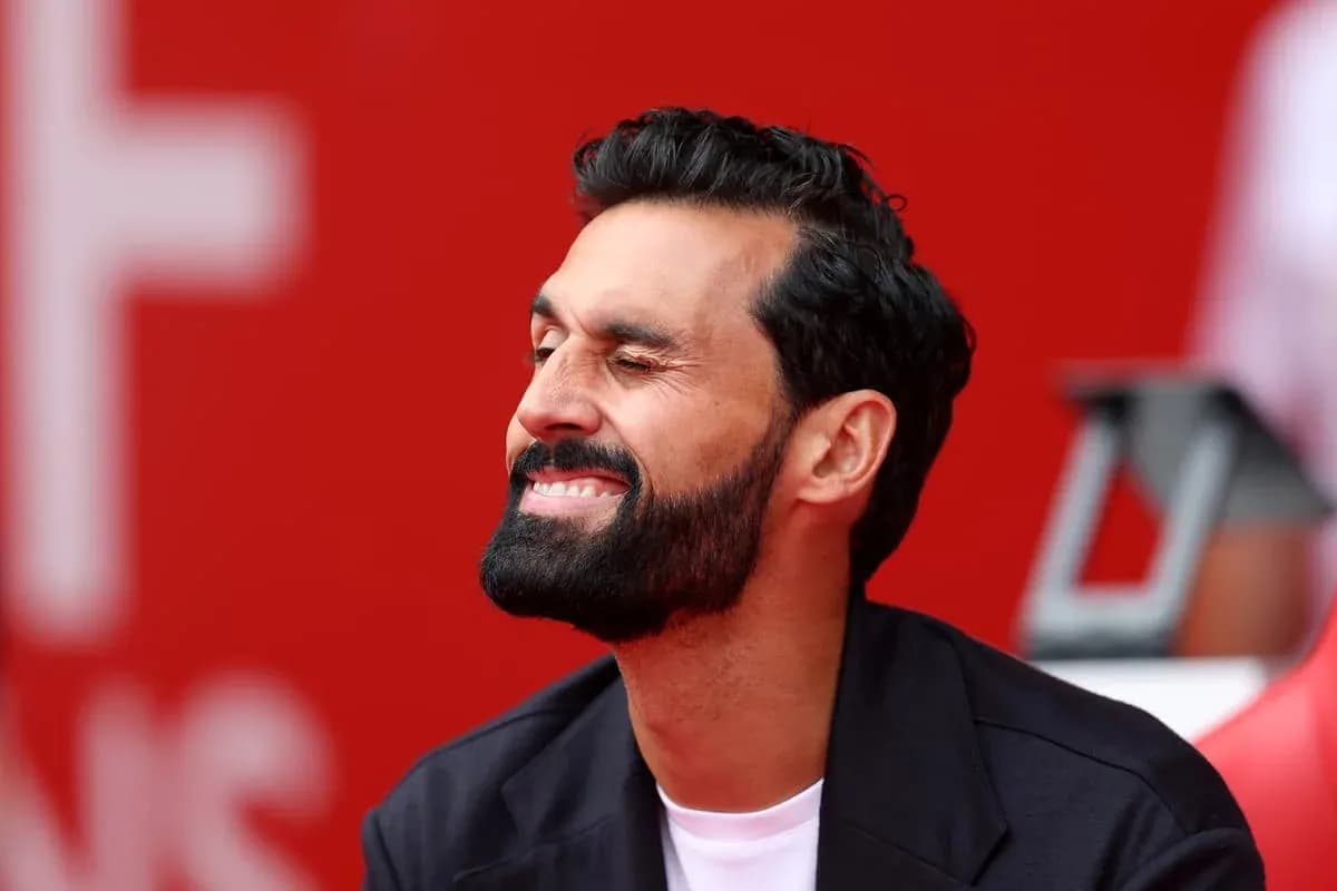 Man smiling while sitting on bench