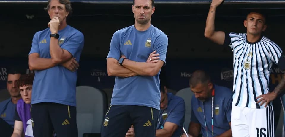 Coaches and staff on bench during match