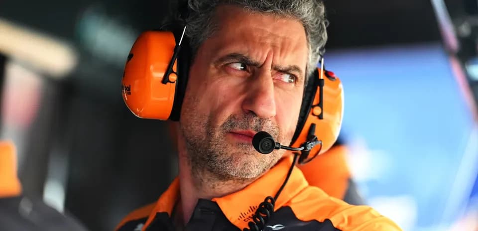 Team principal with headset during racing event