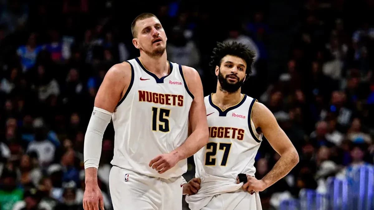Nuggets players walking off the court during game