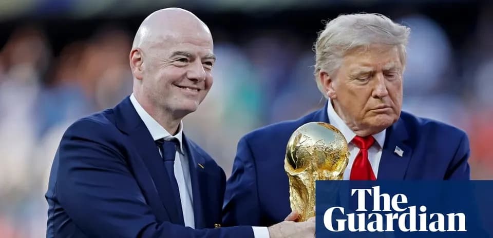 Gianni Infantino and Donald Trump holding World Cup trophy