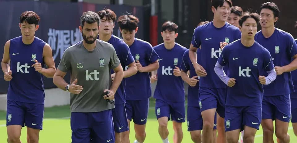Korea team jogging during training session on field
