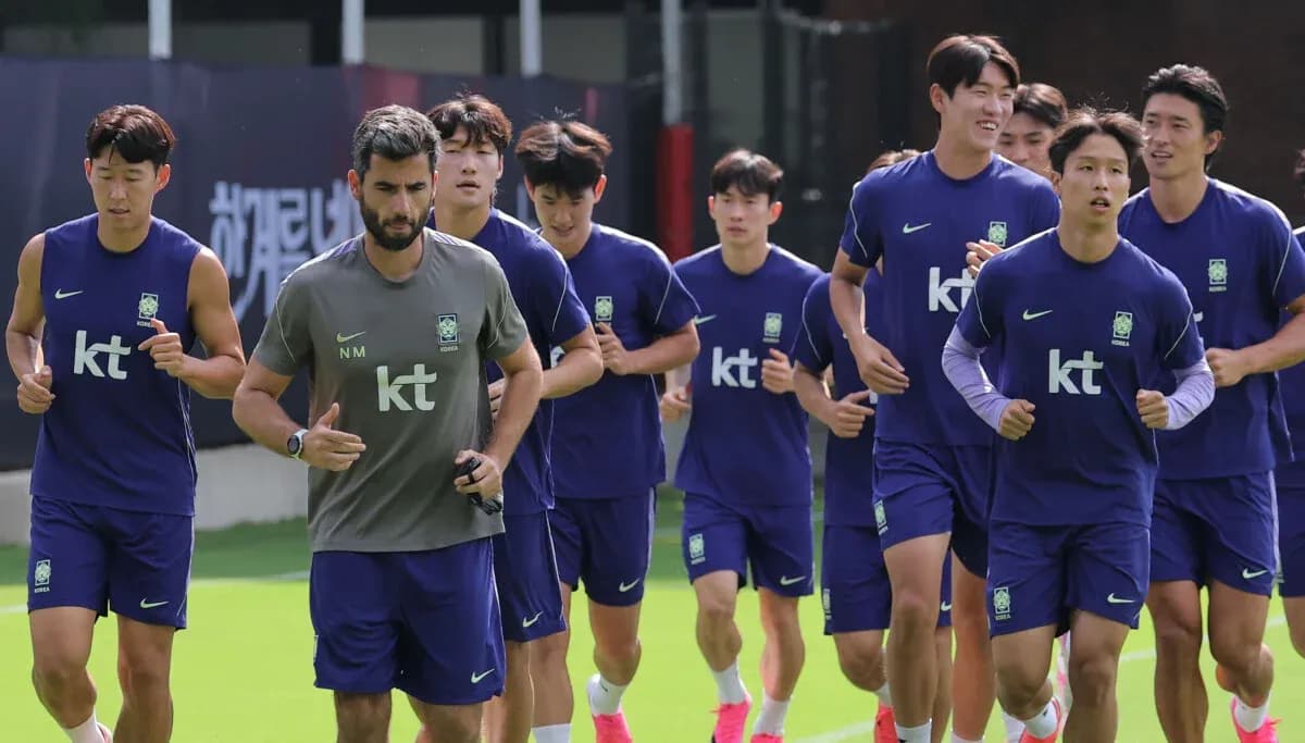 Korea team jogging during training session on field