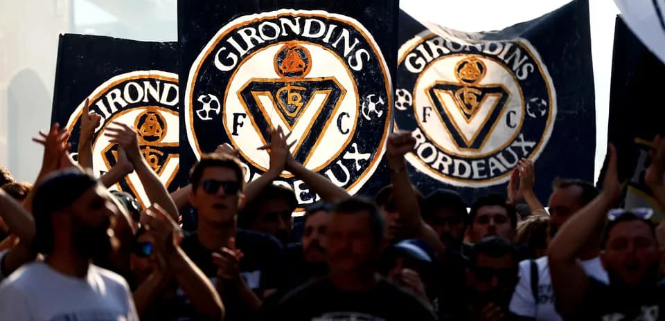 Girondins de Bordeaux fans with banners during event