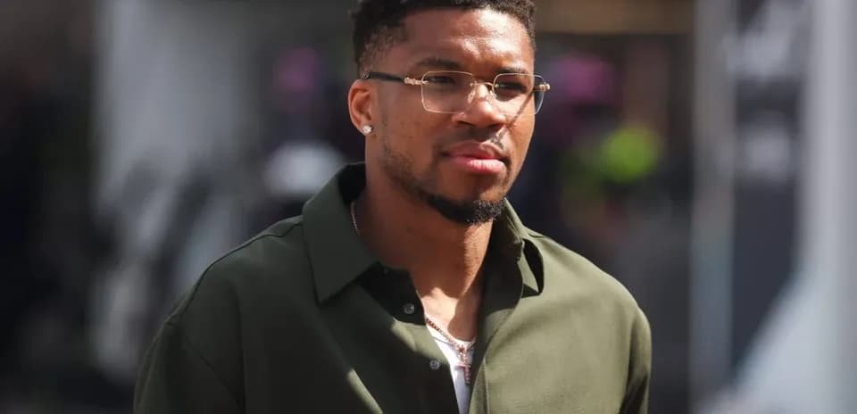 Basketball player walking in a stylish outfit