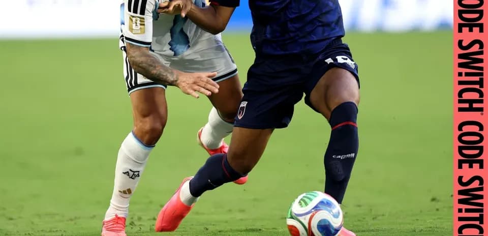 Two players contesting the ball during a match