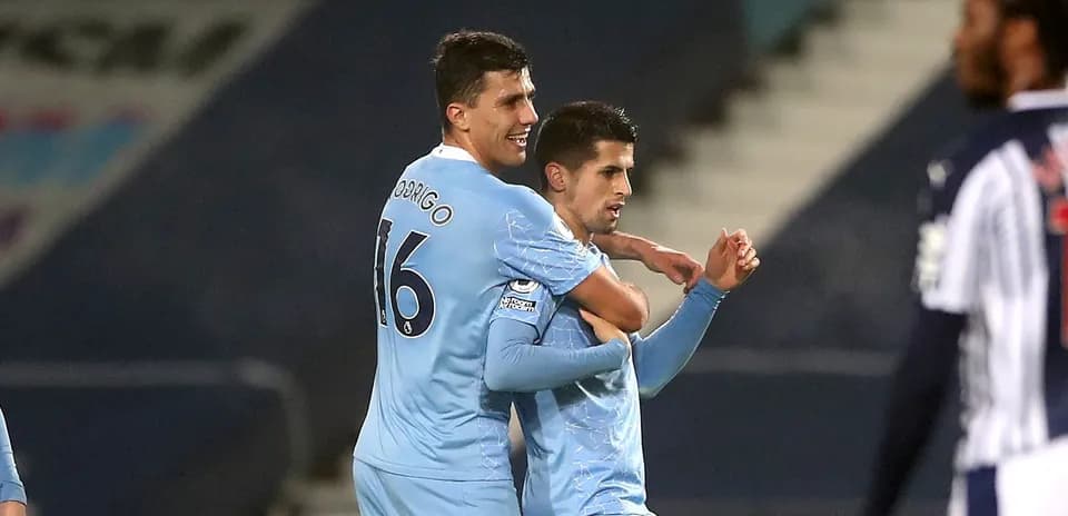 Players celebrating a goal during the match