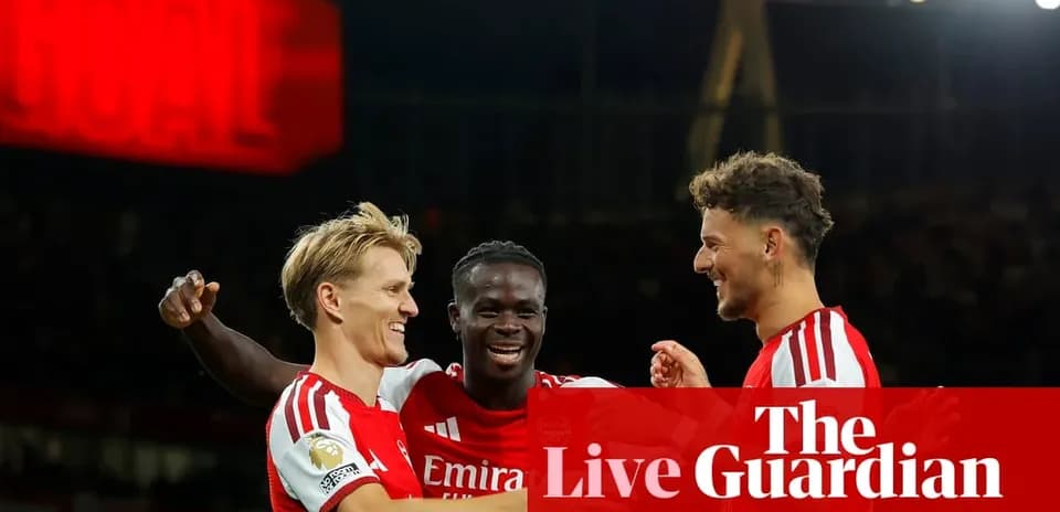 Arsenal players celebrating a goal during a match