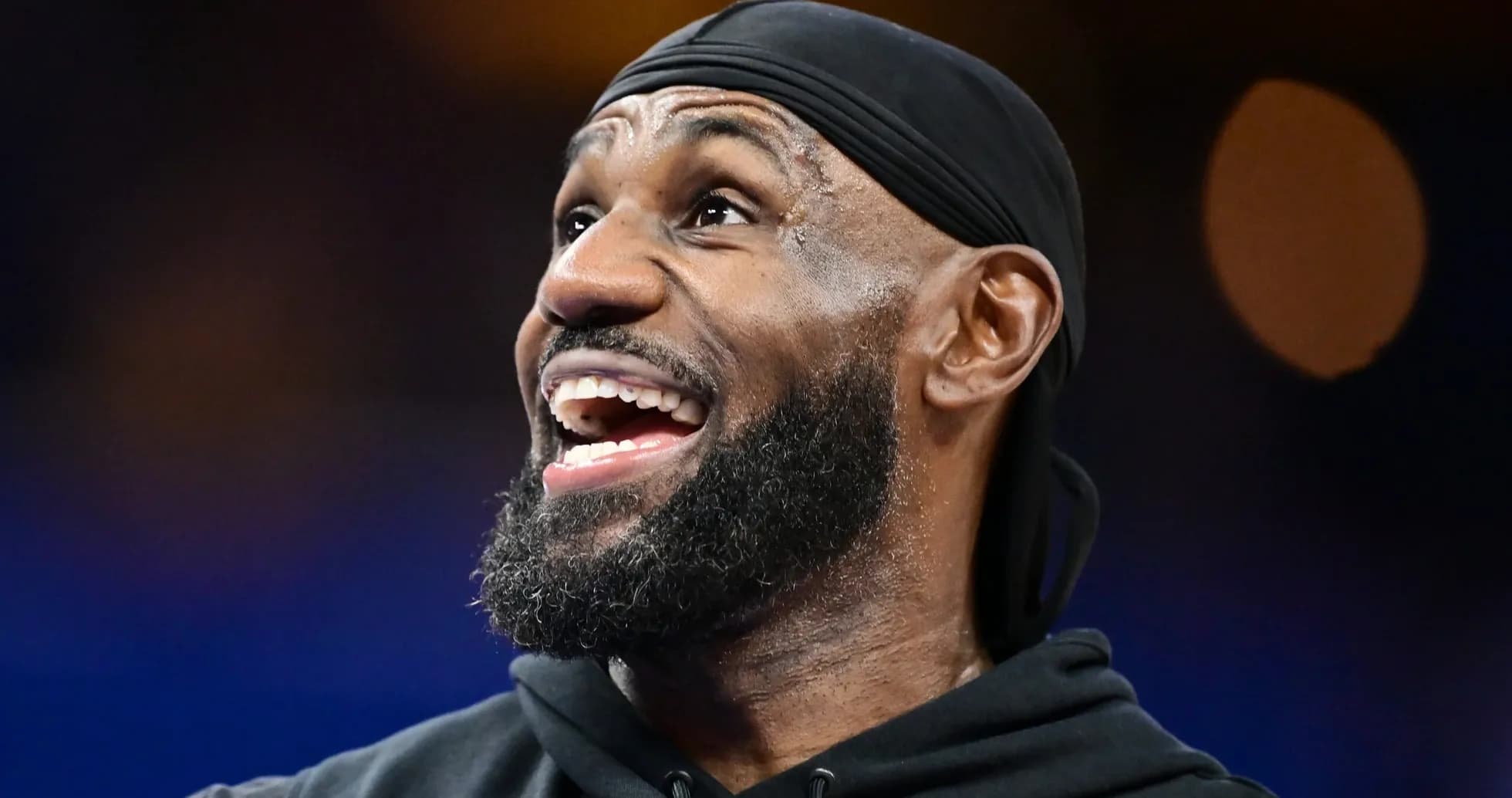 Basketball player smiling during warm-up session