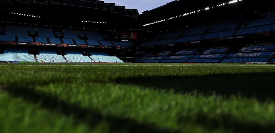 Stadium field view with empty seats before match
