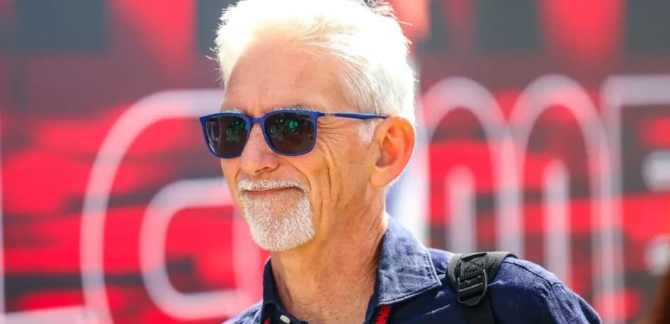 Person wearing sunglasses at a sports event