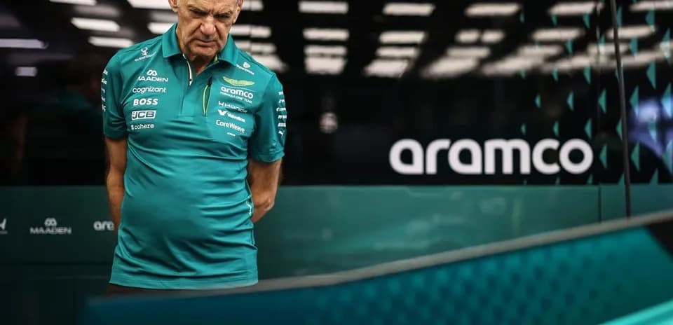 Team member observing car in garage