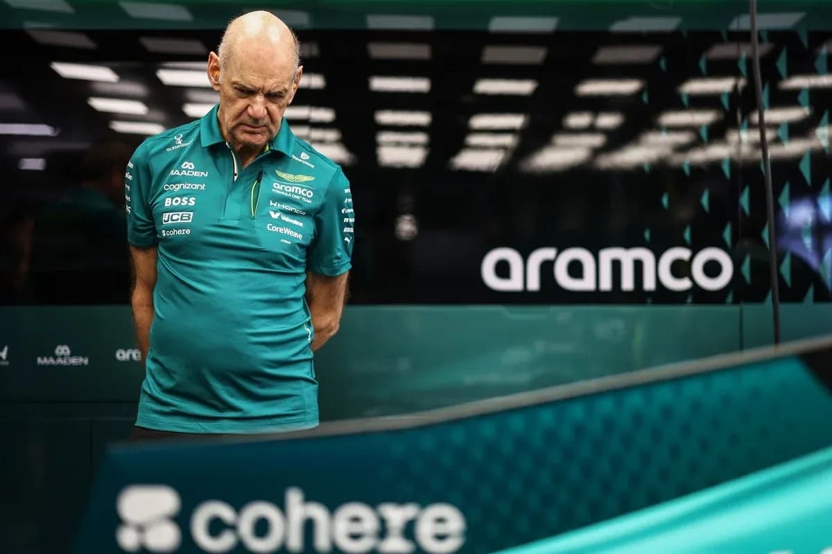 Team member observing car in garage