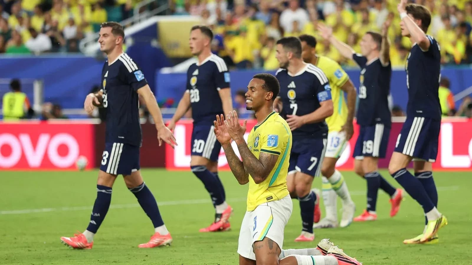 Brazillian player kneeling during match against Scotland